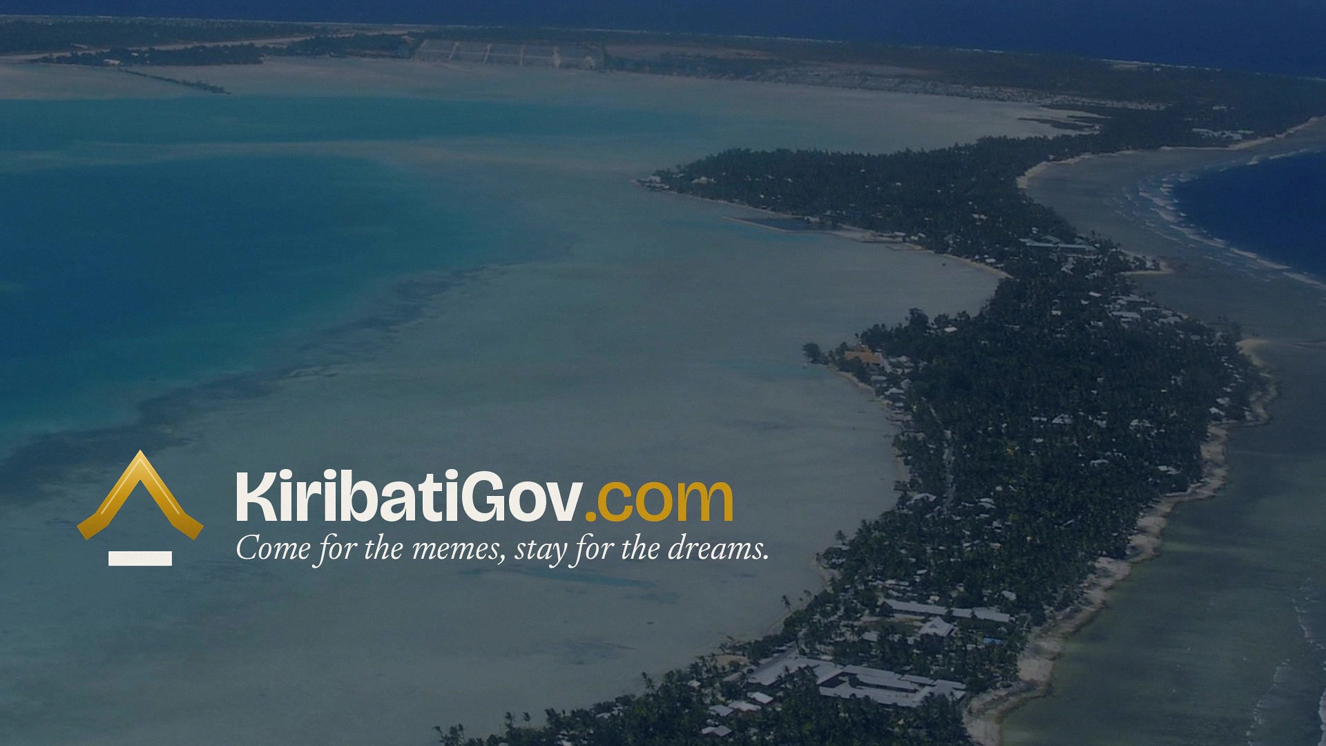 An aerial view of South Tarawa at dusk, with the KiribatiGov.com lockup and tagline over the lagoon.